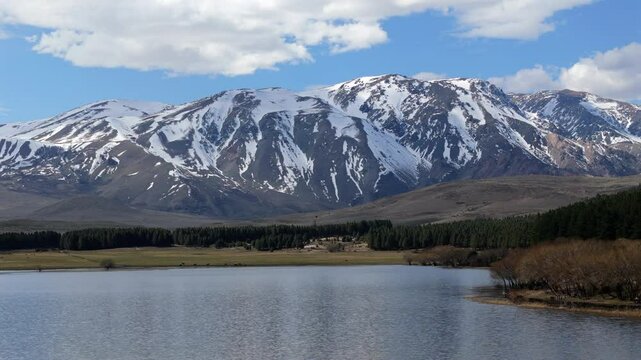 Wide-angle landscape of Laguna La Zeta in natural reserve near Esquel, Patagonia, Argentina.