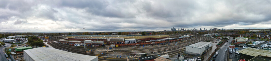 Fototapeta premium Aerial High Resolution Panoramic View of Manchester City During Autumn Season and Cloudy Day over England Great Britain. High Angle Drone's Camera Footage was Captured on October 29th, 2024