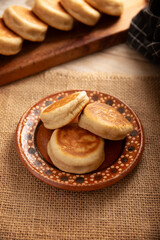 Gorditas de Nata. Cream Gorditas, Mexican street snack, is an easy recipe made with wheat flour, cream, sugar and cinnamon, sweet bread similar in shape to an English muffin, eaten as a dessert.