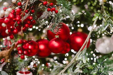 A tree with red and green decorations