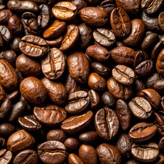 Fototapeta premium Assorted coffee beans, including light roasted and dark roasted varieties, arranged in a textured background 