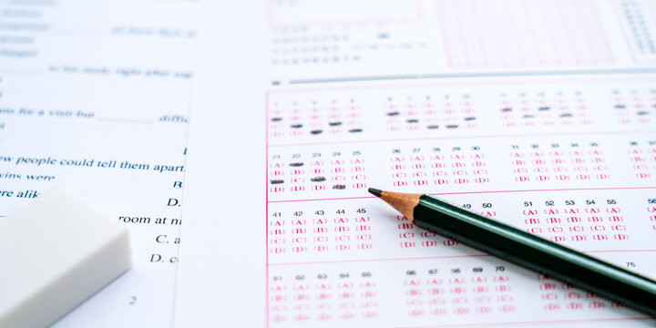 Chinese English Exam answer sheet and a pencil