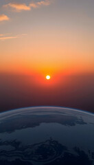 sunrise over the earth, with white tones