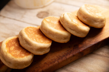 Gorditas de Nata. Cream Gorditas, Mexican street snack, is an easy recipe made with wheat flour, cream, sugar and cinnamon, sweet bread similar in shape to an English muffin, eaten as a dessert.