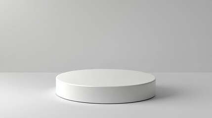 White cylindrical pedestal on a light grey background
