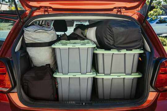 Extremely full hatchback car for a weekend camping trip