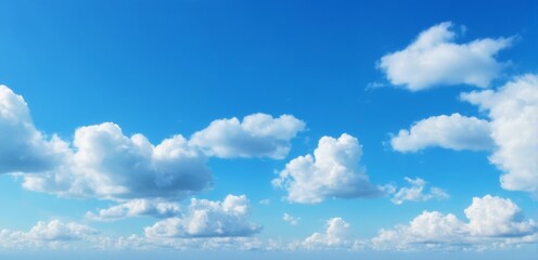 Fototapeta premium Tranquil blue sky with fluffy clouds and ocean horizon, creating a serene atmosphere with a bright sun shining.