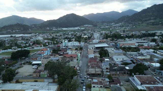 Aerial view of the town center of Constanza in the La Vega province in the Central Range of the Dominican Republic during sunset