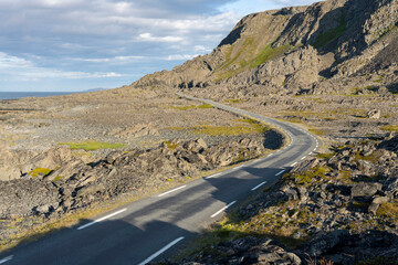 A small winding coastal road between Vardø and Hamningberg in Varanger Peninsula, Northern Norway