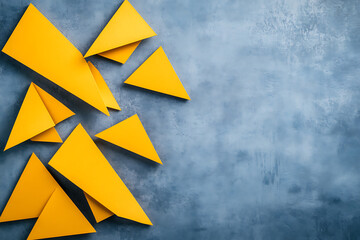 Scattered Yellow Triangles on Textured Blue Background