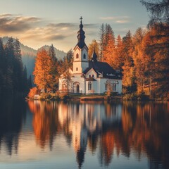 Obraz premium Catholic church at sunset lake