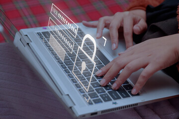 cyber security concept, woman hand typing on keyboard with login and password on screen display,...