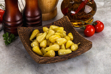 Turkish traditional marinated mini chili peppers