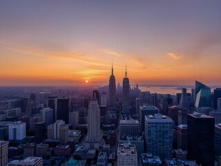Fototapeta premium skyline at sunset showcases new skyscrapers and urban architecture