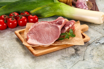 Raw pork steak loin with bone