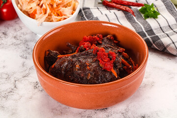 Baked beef cheeks with vegetables