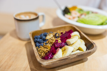 Delicious smoothie bowl with granola and fresh fruits