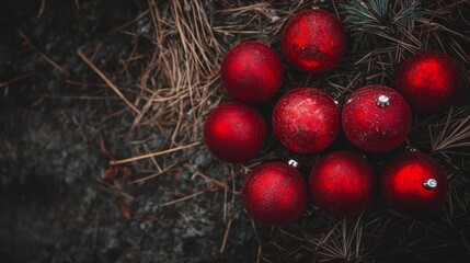 Top view of red christmas ornaments with shiny surface, scattered on a festive holiday background with sparkling details, perfect for seasonal decorations and new year celebrations.


