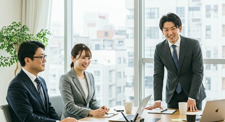 Successful Business Planning: A Team of Professionals in a Bright and Modern Japanese Office