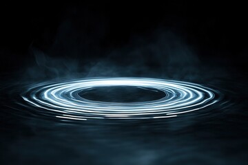 glowing circular ripple spreading outward on reflective black surface under dim lighting