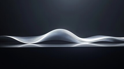 ripple of light forming abstract wave pattern on smooth dark surface under bright natural light