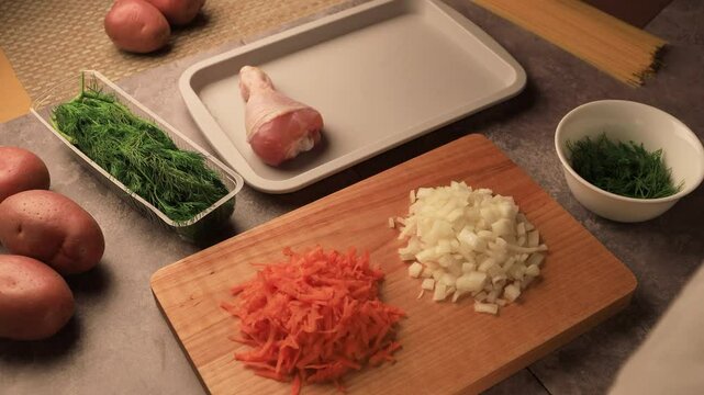 Healing and fat-burning fitness food. Ingredients for the recipe of diet chicken soup with vegetables close-up.Preparing for cooking.