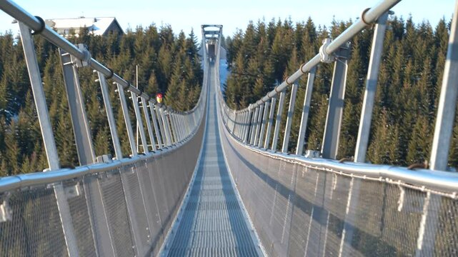 Sky Bridge 721, Lower Moravia, Czech Republic - December 1, 2024: The longest pedestrian suspension bridge in the world. Mountain resort Dolni Morava