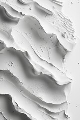 Obraz premium Aerial view of abstract white sand dunes with intricate patterns, highlighting shadows and light for a minimalistic effect.