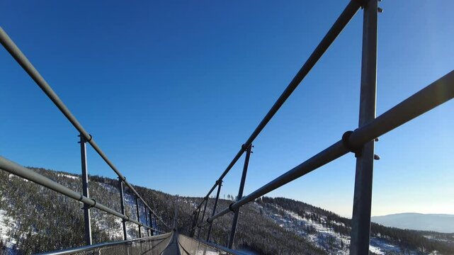 Sky Bridge 721, Lower Moravia, Czech Republic - December 1, 2024: The longest pedestrian suspension bridge in the world. Mountain resort Dolni Morava
