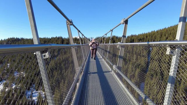 Sky Bridge 721, Lower Moravia, Czech Republic - December 1, 2024: The longest pedestrian suspension bridge in the world. Mountain resort Dolni Morava