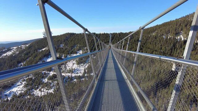 Sky Bridge 721, Lower Moravia, Czech Republic - December 1, 2024: The longest pedestrian suspension bridge in the world. Mountain resort Dolni Morava