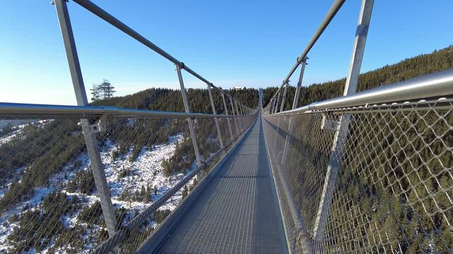 Sky Bridge 721, Lower Moravia, Czech Republic - December 1, 2024: The longest pedestrian suspension bridge in the world. Mountain resort Dolni Morava