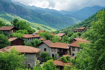 Obraz premium Mountain village nestled in valley, traditional stone houses with red tile roofs.