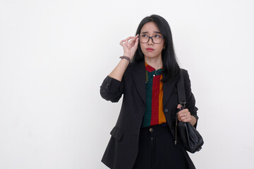 Asian female manager fixing her black eyeglasses trying to read a business announcement