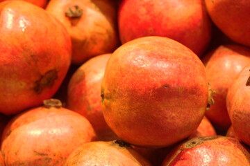The pomegranate (Punica granatum) is a fruit-bearing shrub or small tree known for its vibrant, jewel-like seeds and rich history in cultures around the world. 