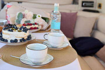 An Elegant Afternoon Tea Setup on a Luxurious Yacht with Delectable and Tasty Desserts to Enjoy