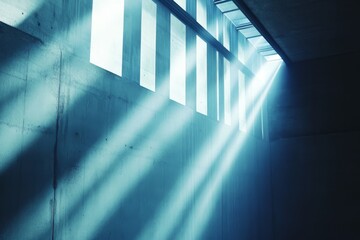Obraz premium A blue wall with a window and sunlight shining through it. The sunlight is creating a bright blue light