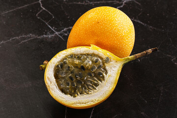 Yellow granadilla with cut half