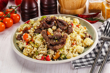 Traditional couscous with beef and vegetables