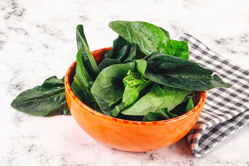 Ripe green spinach leaves heap