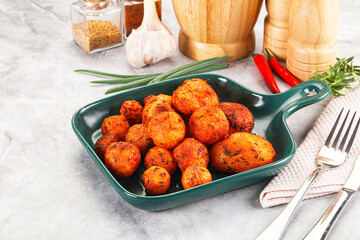 Baked young potato with paprika