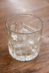 A glass of ice on the table