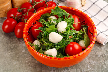 Salad with mozzarella and arugula