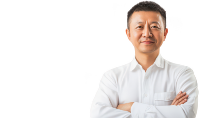 Professional Asian Man Standing Confidently with Arms Crossed