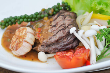 beef steak in gravy sauce or barbecued beef or grilled beef and vegetable