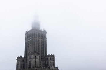 Obraz premium Palace of Culture and Science in Warsaw on a foggy day