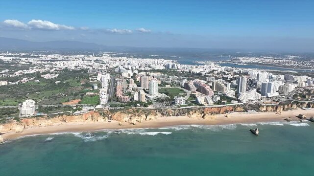 Aerial from Praia da Rocha and the city Portimao in the Algarve Portugal Europe