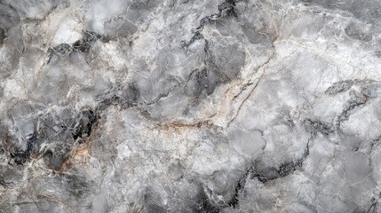Naklejka premium Gray marble granite creates a stunning natural background, perfect for enhancing any design. The wonderful textures of gray marble granite make it an ideal choice for elegant wall presentations.