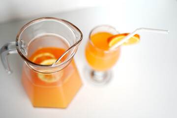 Bright and Refreshing Orange Juice in Jug and Glass. Stock Image