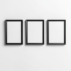 "Three Black Frames on White Wall with Blank Space